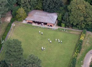 Aerial view of people playing on a bowling green