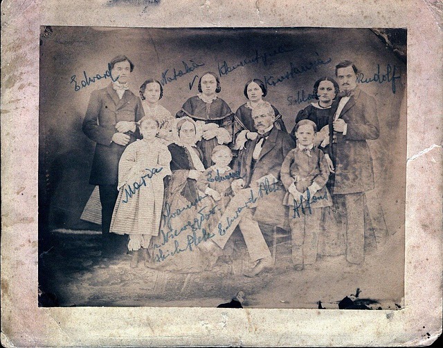old black and white family photo with people's names annotated by hand