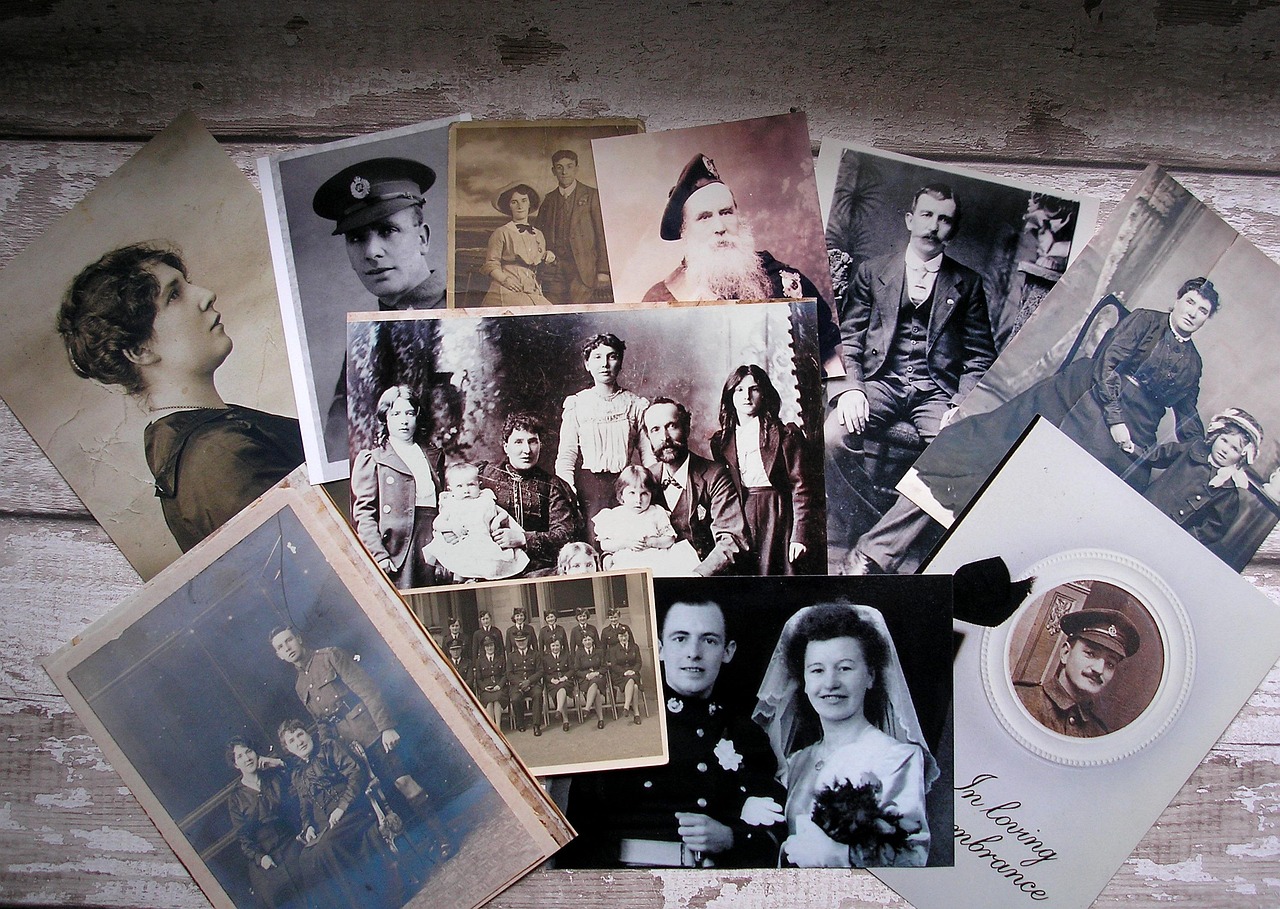 a collection of old photos on a table